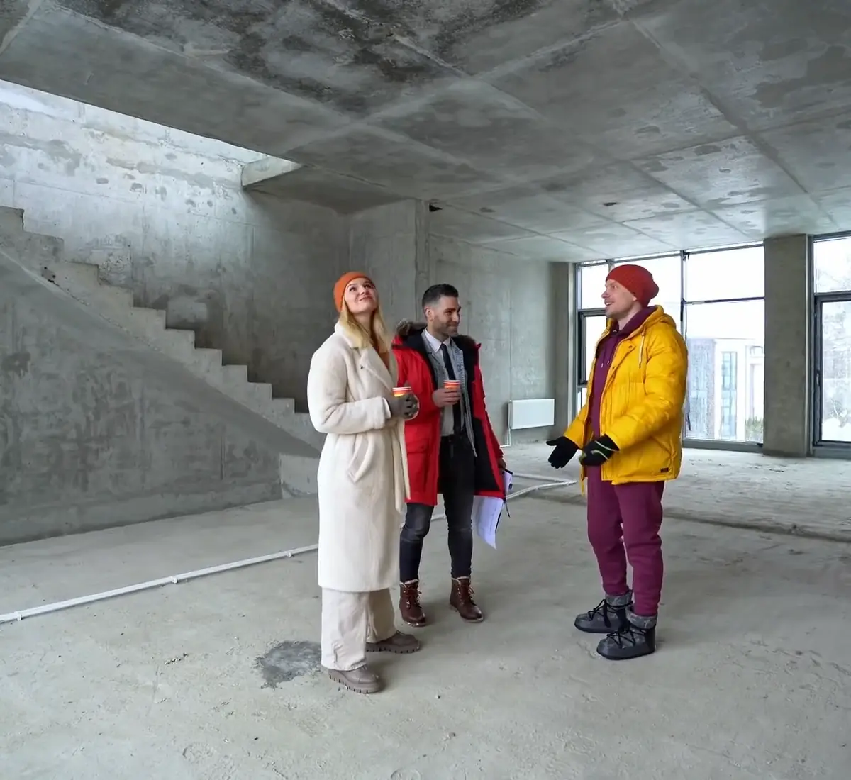 Visita de obra con los clientes durante una reforma integral